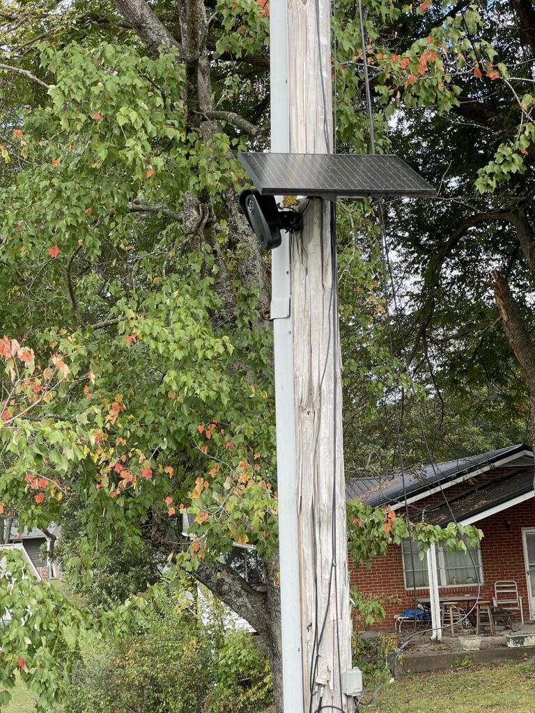 Flock Camera A privately operated Flock Safety camera mounted in a Maryville neighborhood — part of an AI-powered surveillance network that records and stores vehicle data around the clock.
